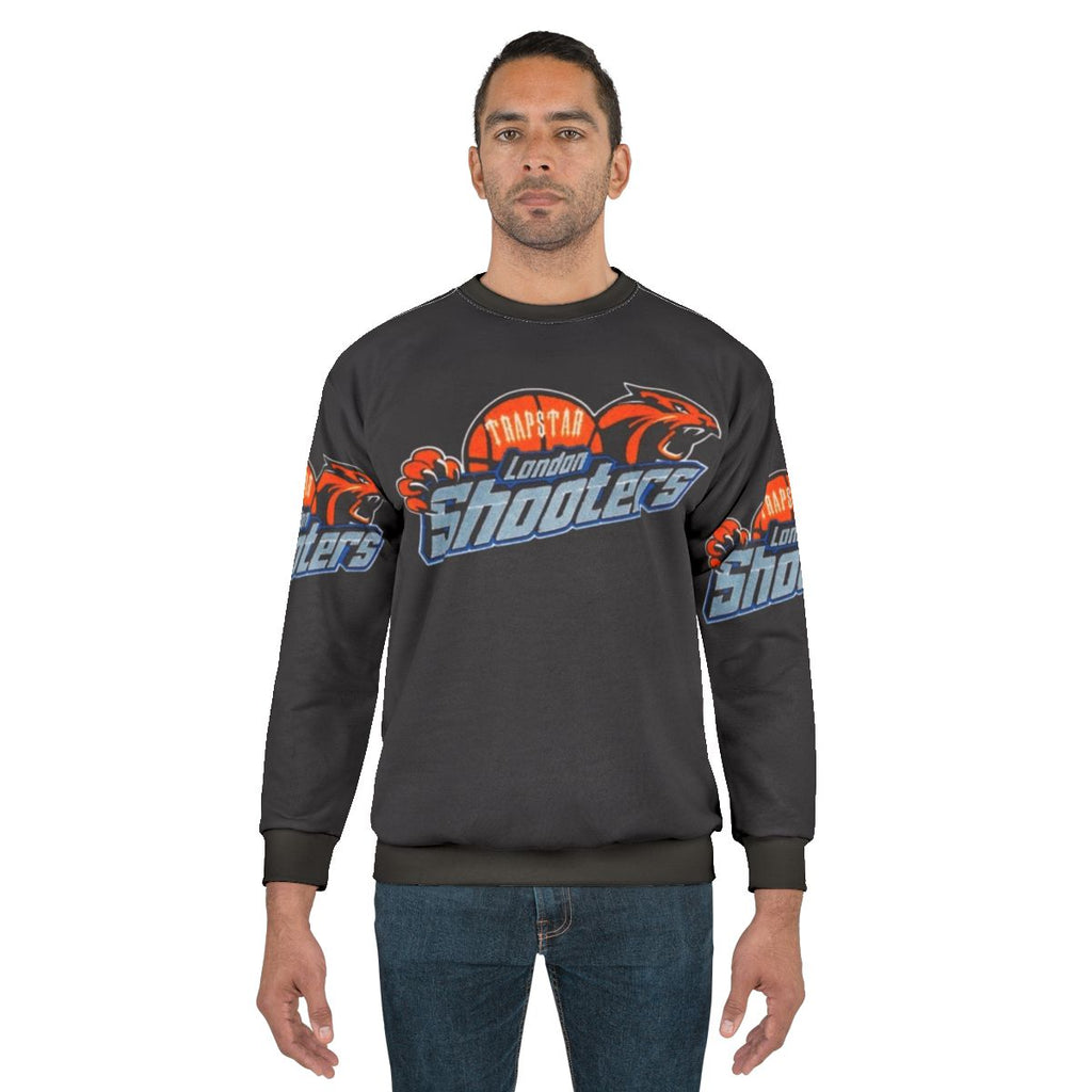 Trapstar Shooters Sweatshirt with Orange Basketball and Tiger Graphics
