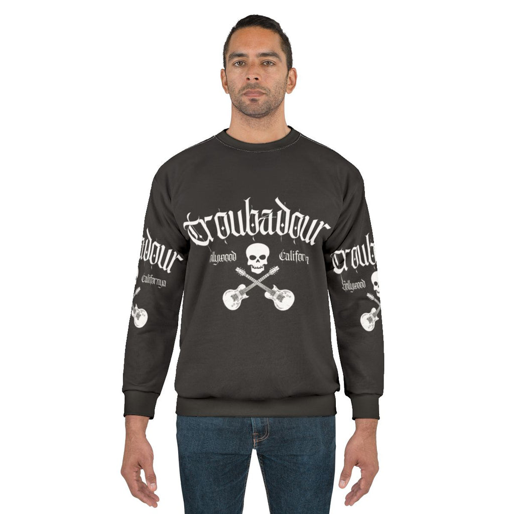 Troubadour Sweatshirt featuring classic 80s rock band skull graphic