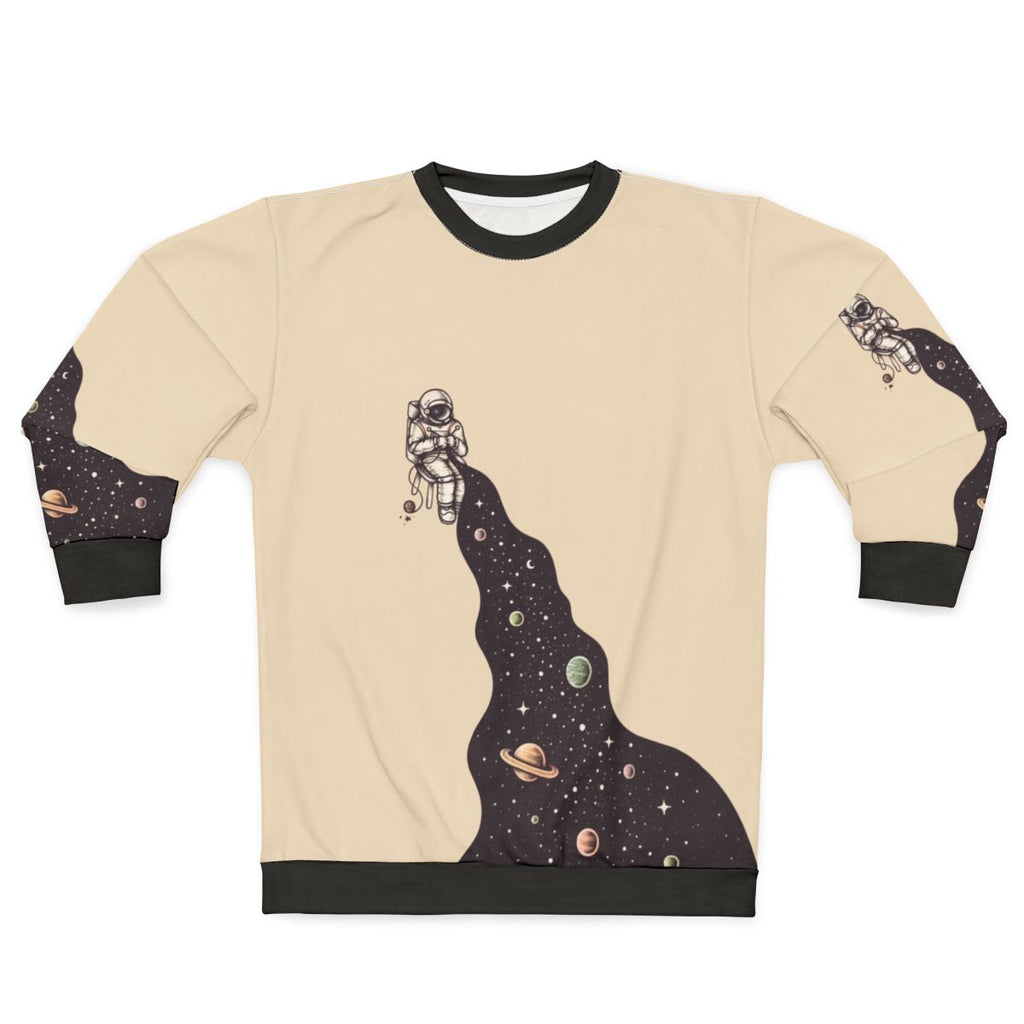 Cosmic universe knit sweatshirt with stars, planets and galaxy design