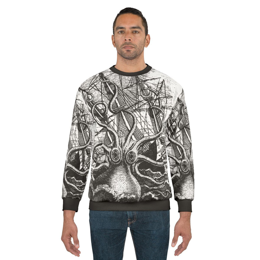 Vintage illustration of the legendary kraken sea monster attacking a ship on a sweatshirt