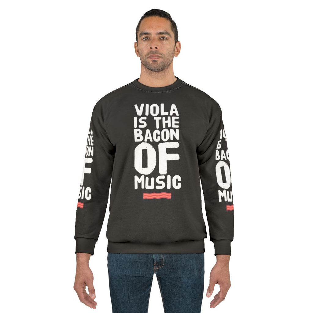Funny viola player sweatshirt with "Viola Is The Bacon Of Music" quote