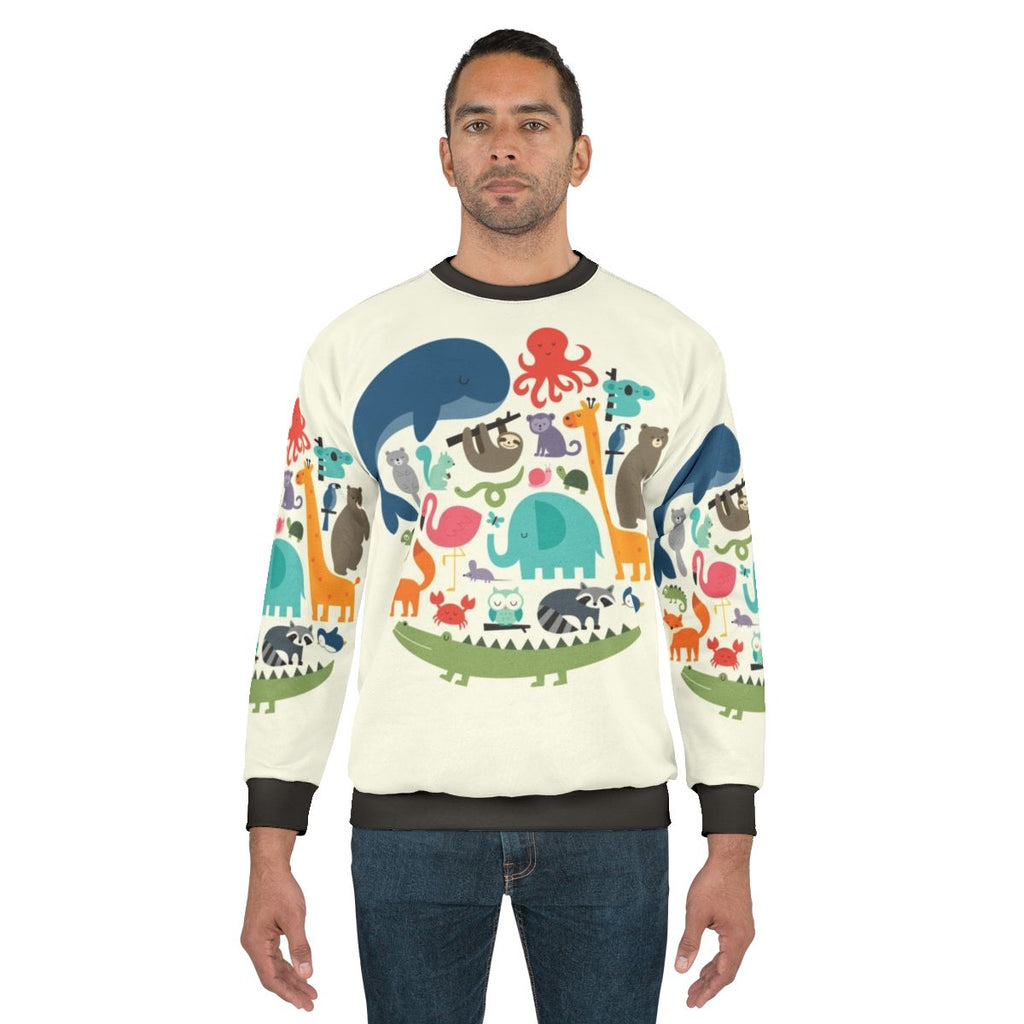 "We Are One" ethical animal print sweatshirt featuring various wildlife animals