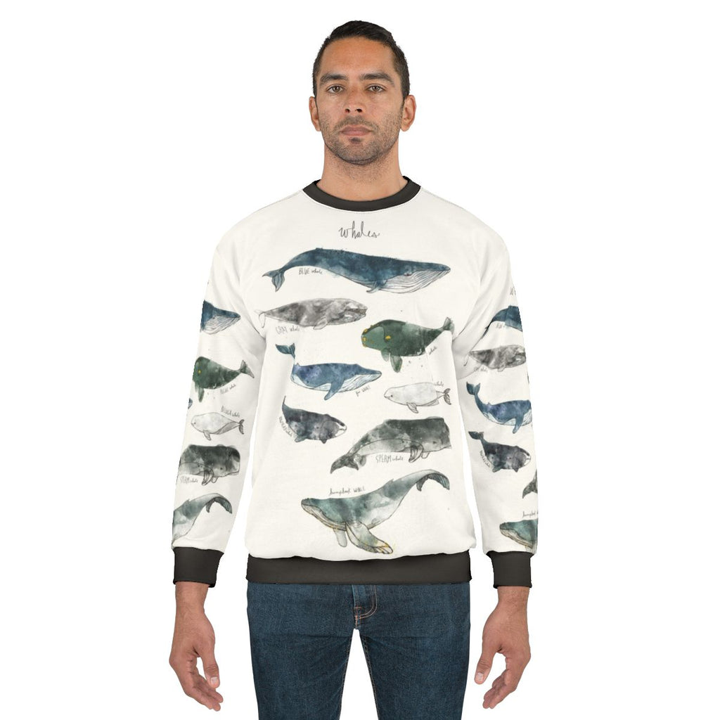 Watercolor whales sweatshirt featuring humpback and beluga whale designs