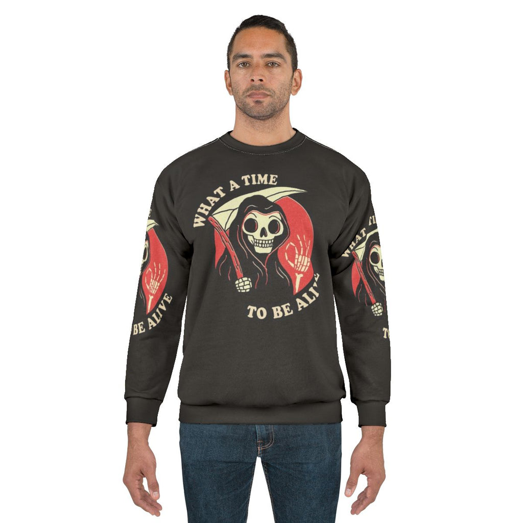 "What A Time To Be Alive" Grim Reaper Character Sweatshirt