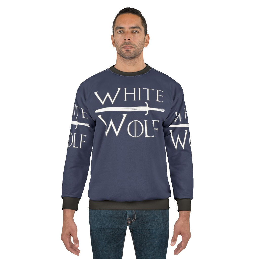 A white sweatshirt with a wolf design, perfect for Game of Thrones fans