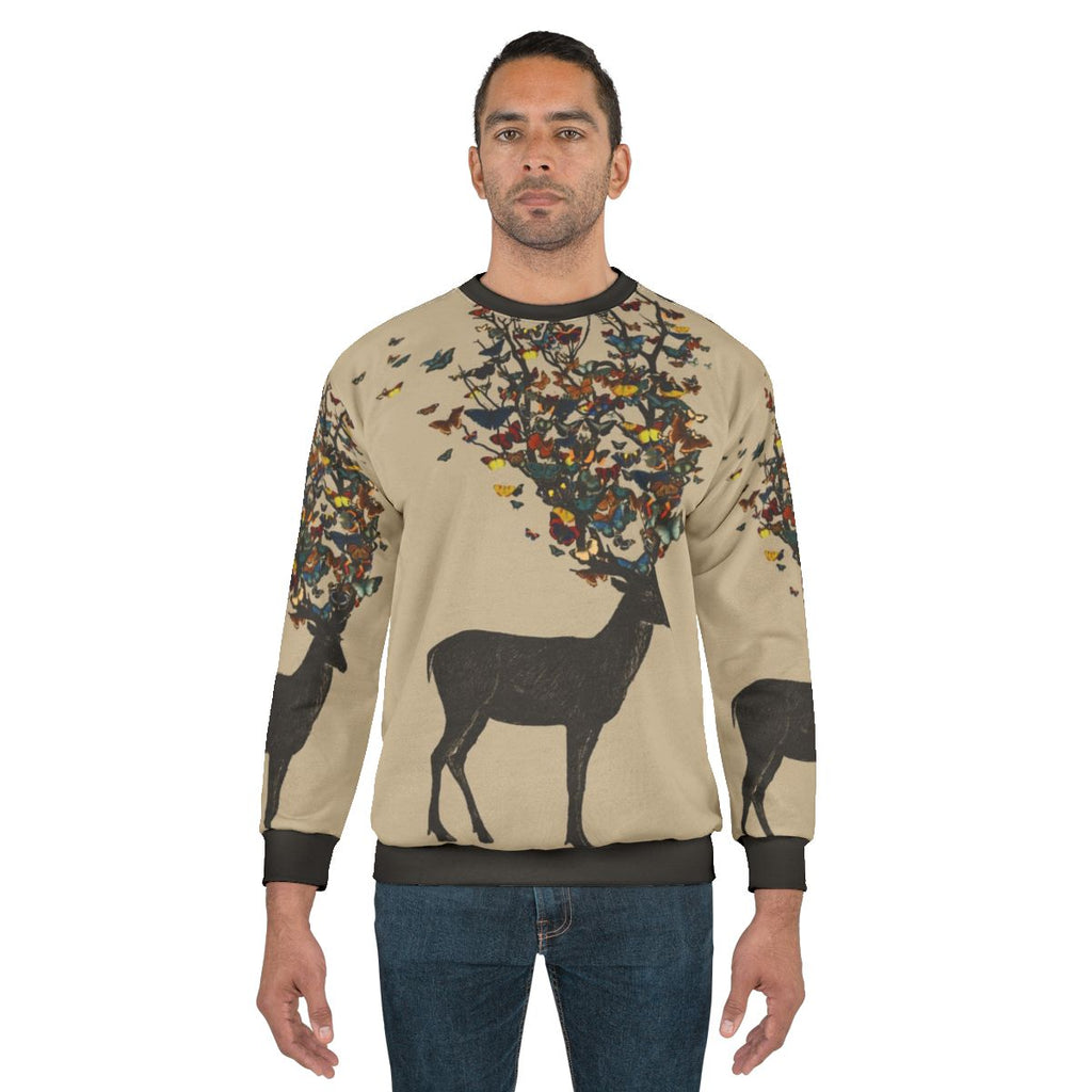 Colorful wild nature sweatshirt with deer and butterfly graphics