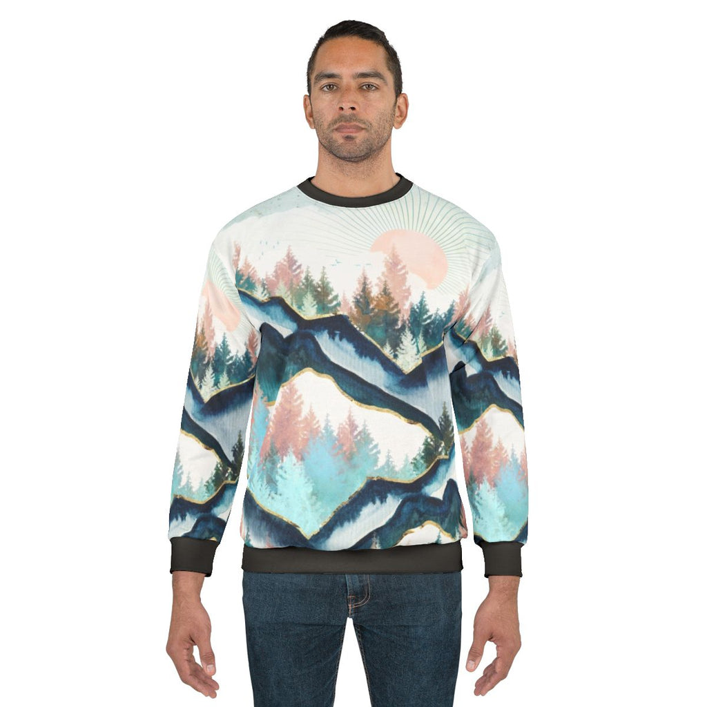 Cozy winter forest sweatshirt with abstract watercolor landscape design
