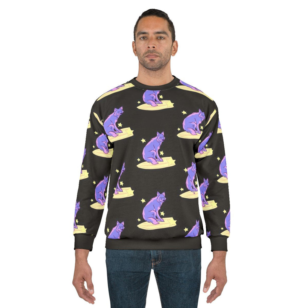 Sweatshirt with a design of a wolf riding among the stars in the night sky