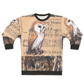Barn owl perched on a tree branch with musical notes