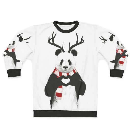 Panda wearing antlers on a cozy Christmas sweatshirt