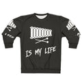 Person wearing a sweatshirt with the text "Xylophone Is My Life"
