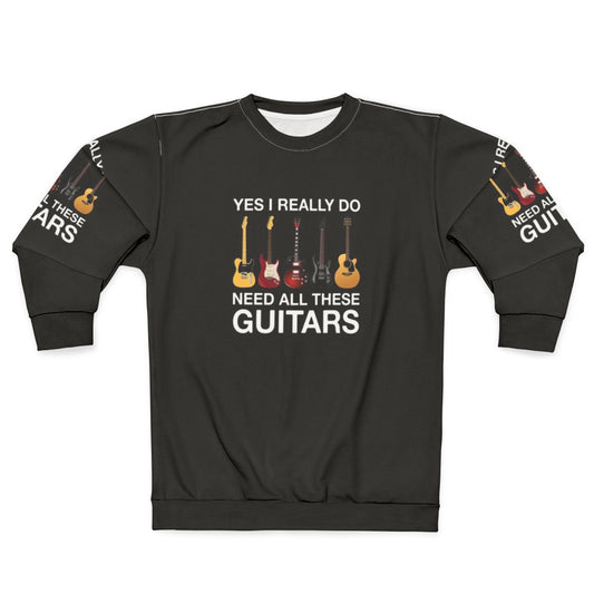 Person wearing a sweatshirt with the text "Yes I Really Do Need All These Guitars"