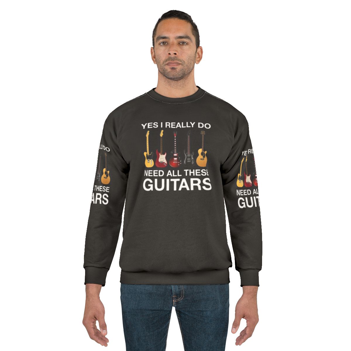 Person wearing a sweatshirt with the text "Yes I Really Do Need All These Guitars"