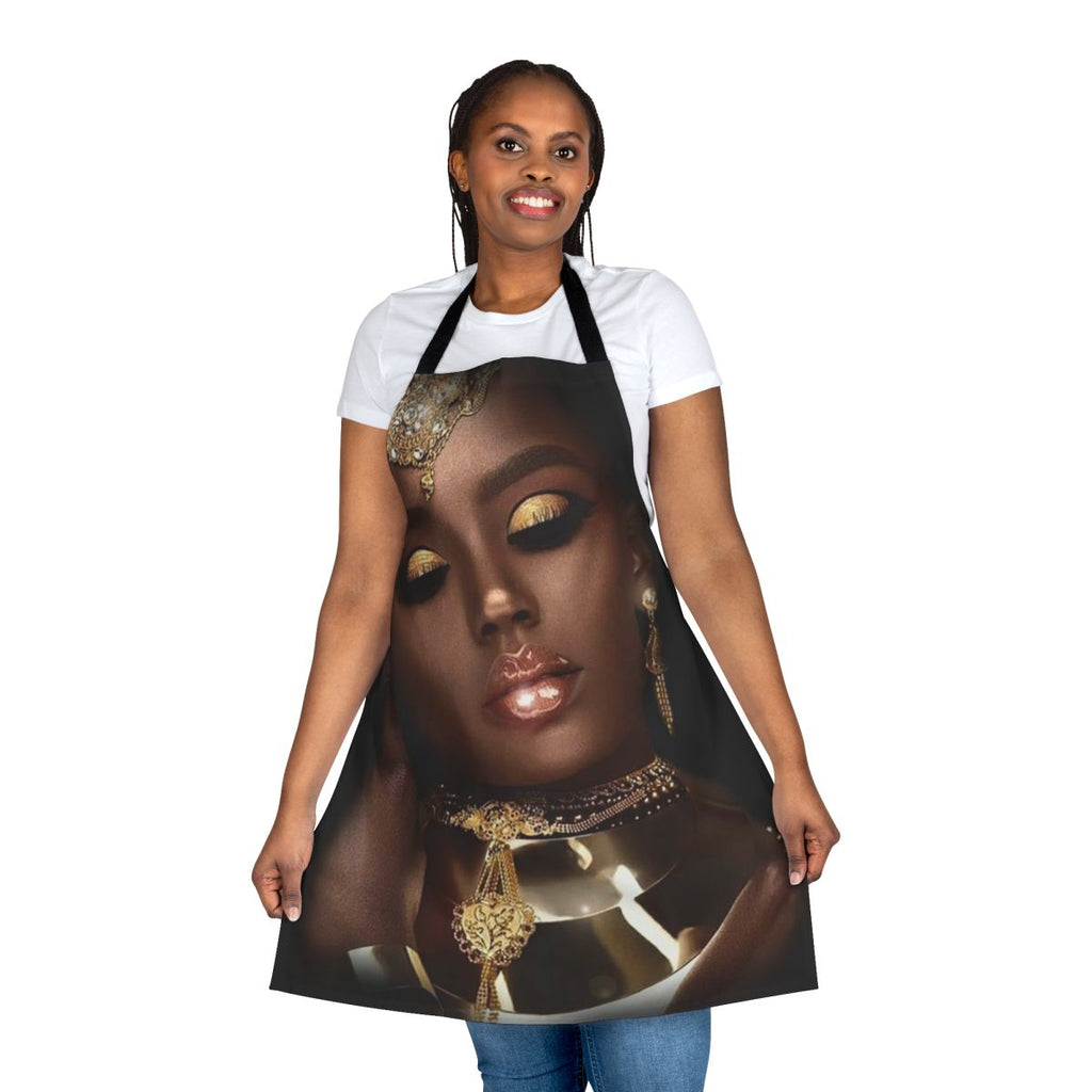 Abstract artistic image of an African woman's face with ornate jewelry and gold dust accents