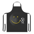 Black and white abstract art apron with a surreal, smiling astronaut design on a moon background.