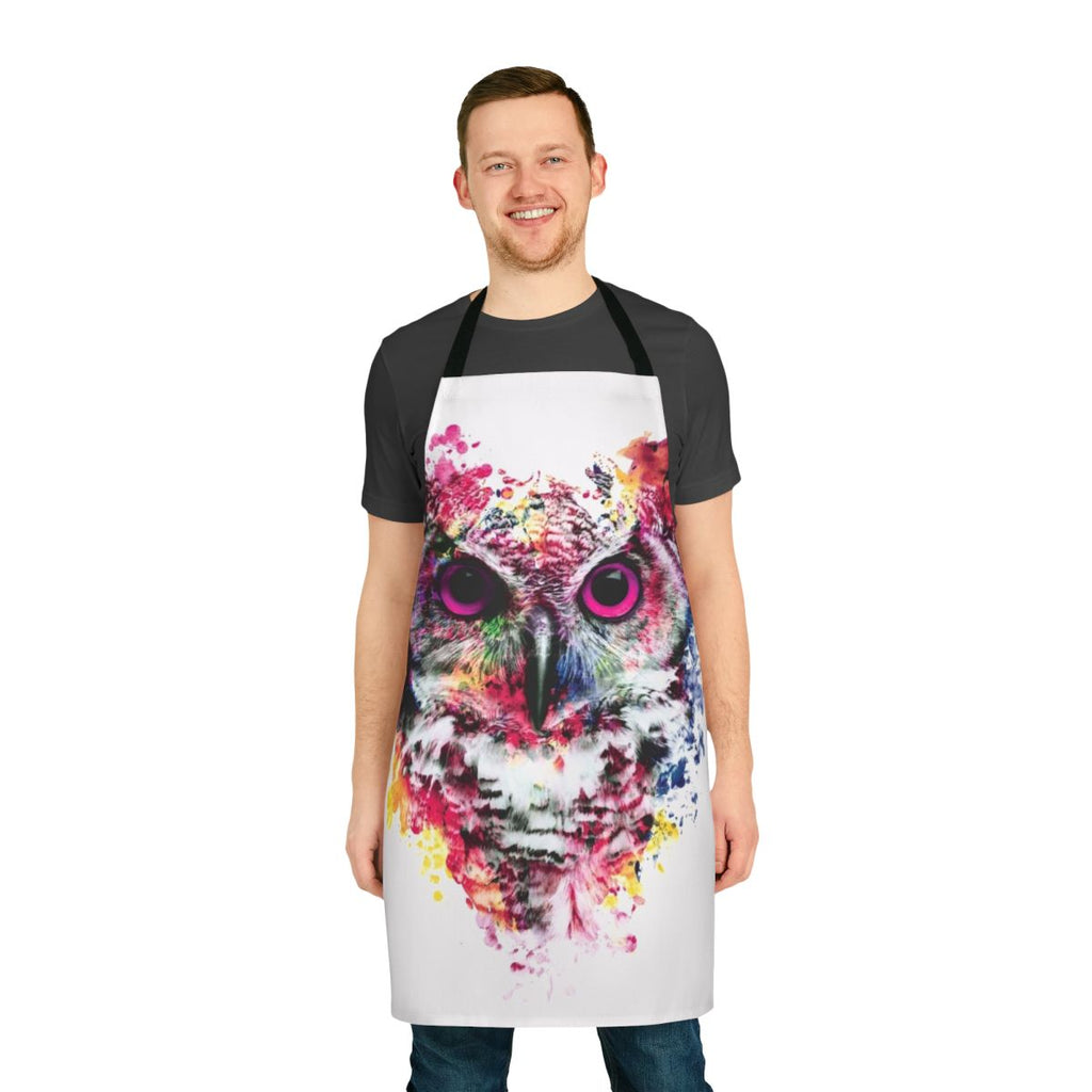 Colorful abstract artwork of an owl's face on an apron, featuring vibrant blues, reds, and yellows.
