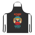 Stylish gray apron with retro gaming and actuary icons, perfect for actuaries who are also passionate gamers.