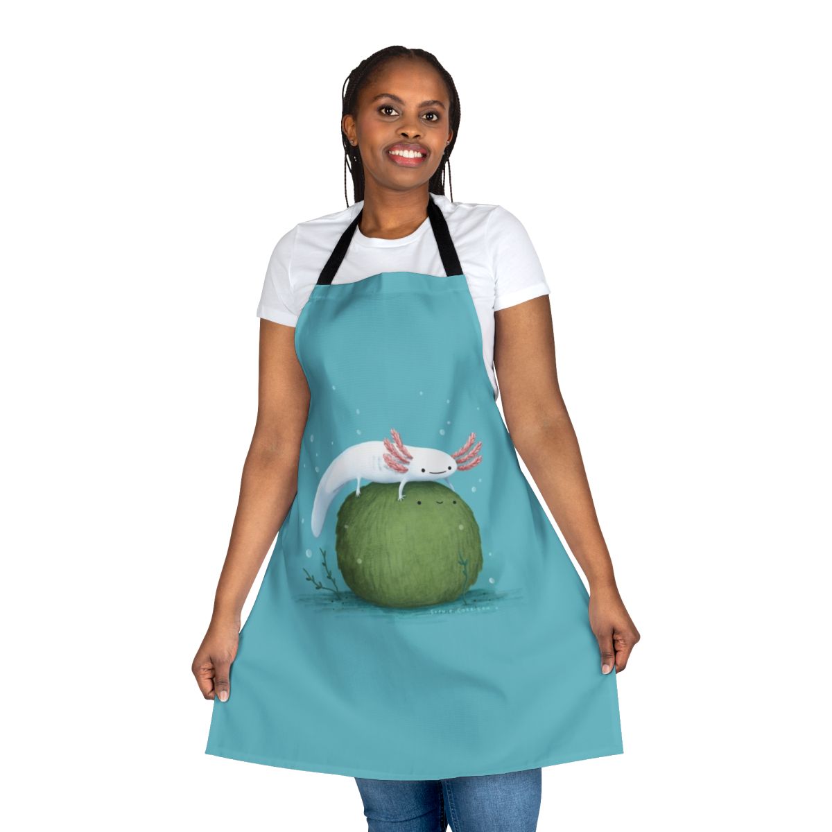 Illustration of a cute axolotl sitting on a green moss-covered ball, featured on a kitchen apron