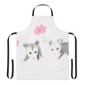 Vibrant floral apron featuring a cute baby opossum surrounded by pink petunia flowers
