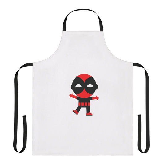 Cute baby wearing a superhero-themed apron