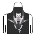 Cute tabby cat snuggled in a baby carrier apron