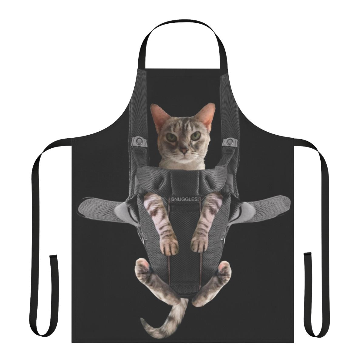Cute gray cat sitting in a baby carrier attached to a gray apron