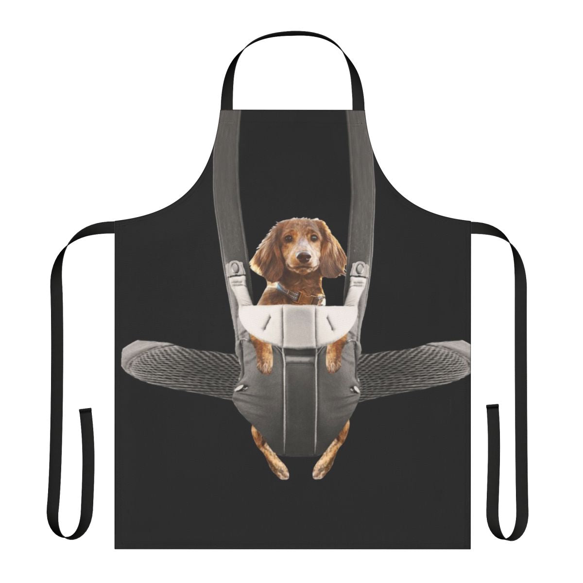 A dachshund dog sitting in a baby carrier, printed on an apron for dog owners and pet parents
