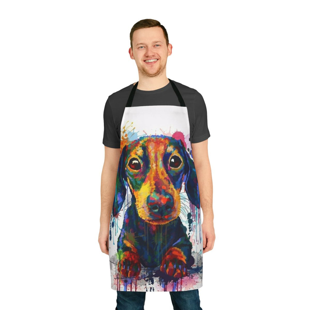 Dachshund dog wearing a cute apron with a cartoon design