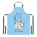 A cozy, dog-themed apron with a playful "Dogtor" pun design