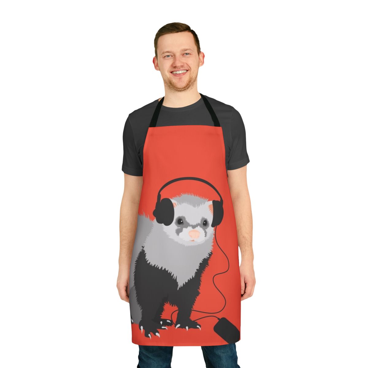 A black-footed ferret wearing headphones and a musical note pattern apron