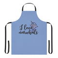 "A vibrant purple and pink apron featuring a cute narwhal design, perfect for fans of these legendary marine animals."