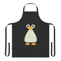 Penguin-patterned apron with cute cartoon penguins in an arctic setting