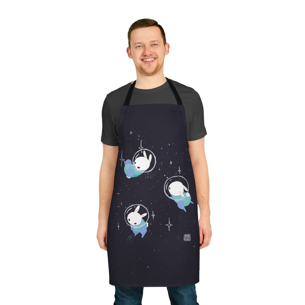 Vibrant digital illustration of a space-themed apron featuring cute bunnies and celestial elements