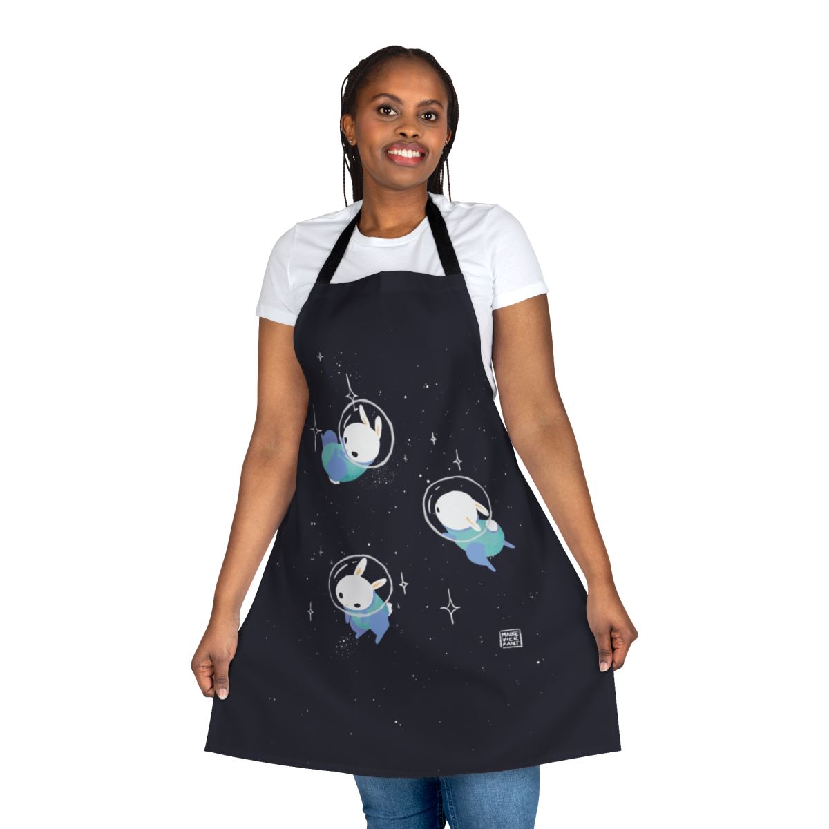 Vibrant digital illustration of a space-themed apron featuring cute bunnies and celestial elements
