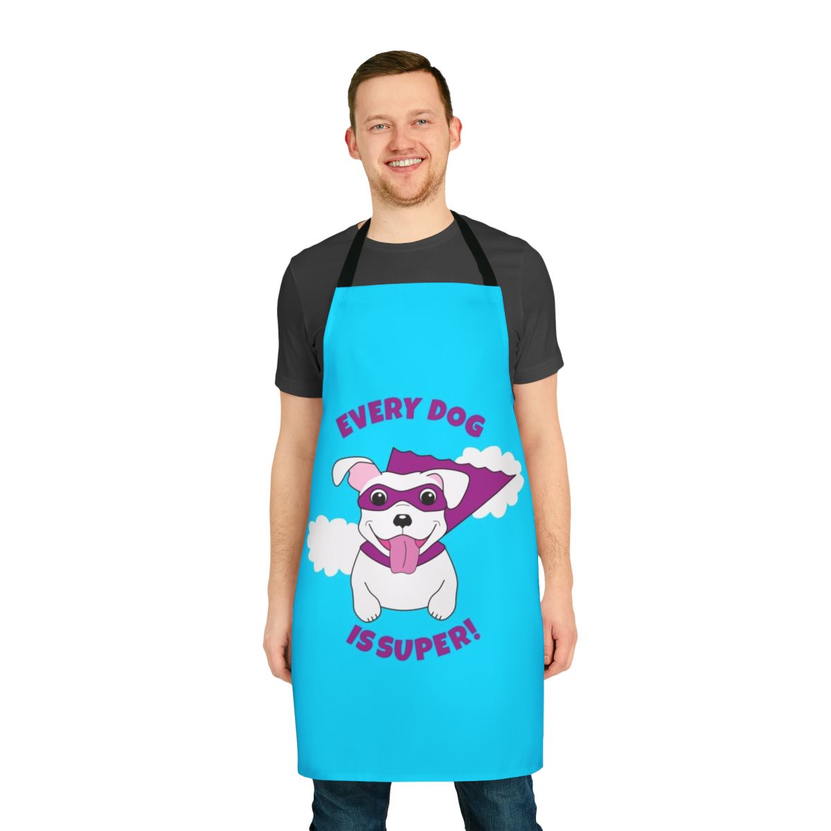 White dog wearing a superhero cape and flying, on an apron