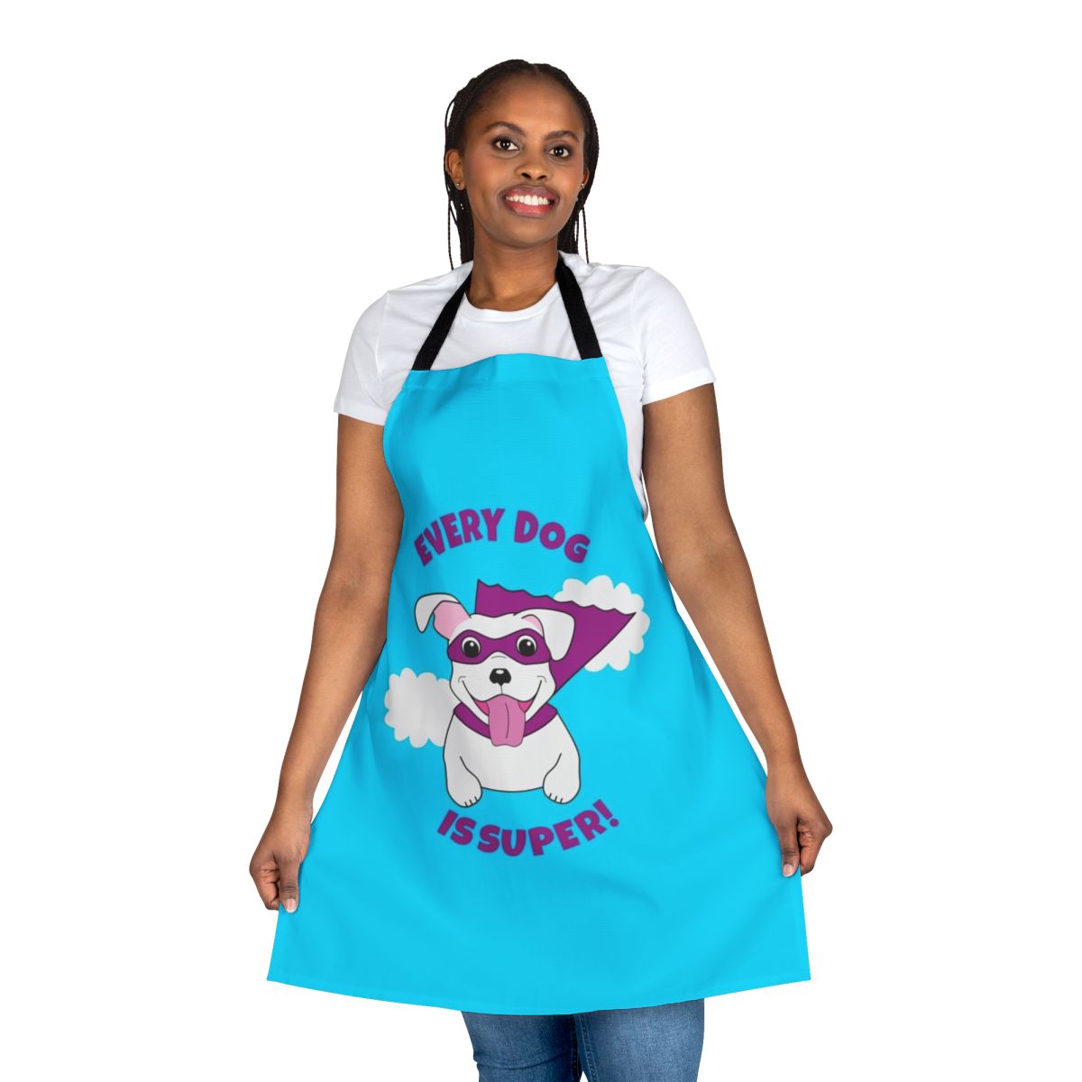 White dog wearing a superhero cape and flying, on an apron