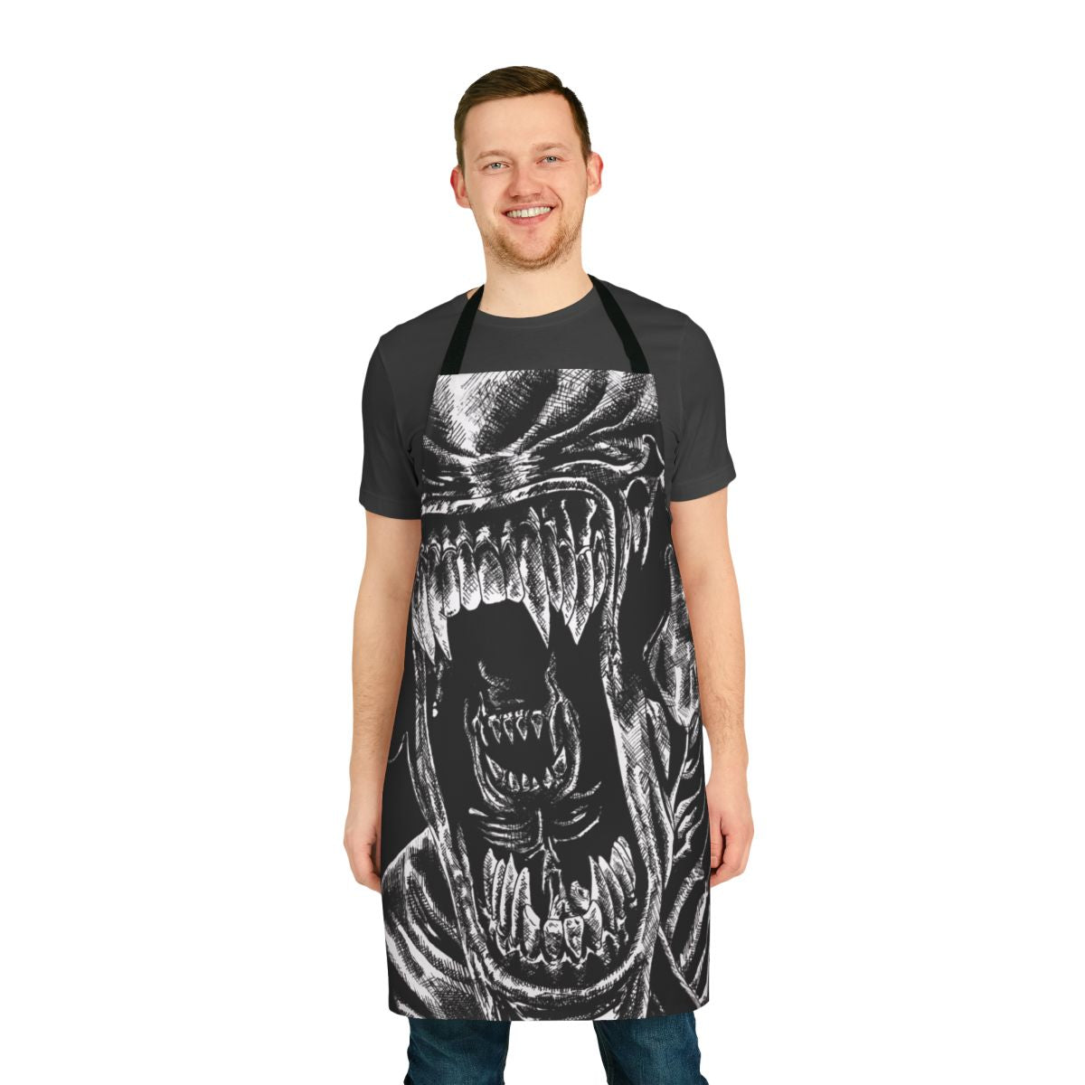 Alien-inspired horror apron with a detailed xenomorph design in the style of H.R. Giger's iconic artwork