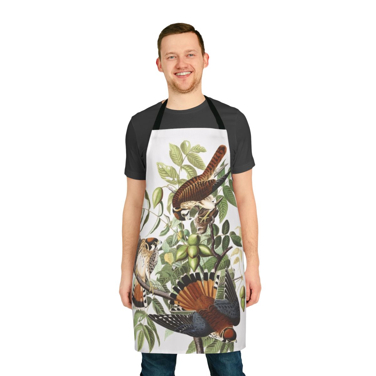 An apron featuring a detailed illustration of an American Kestrel, a small bird of prey, in the style of renowned naturalist artist John James Audubon.