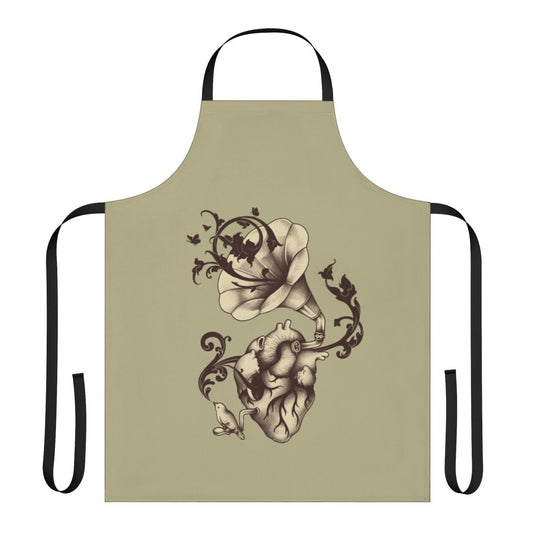 Apron featuring an anatomical heart design with vintage music elements and nature imagery