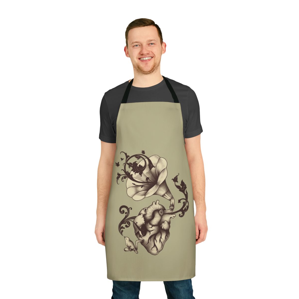 Apron featuring an anatomical heart design with vintage music elements and nature imagery