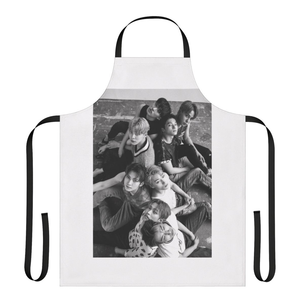 ATEEZ members featured on a custom-designed apron inspired by the group's Dazed magazine photoshoot.
