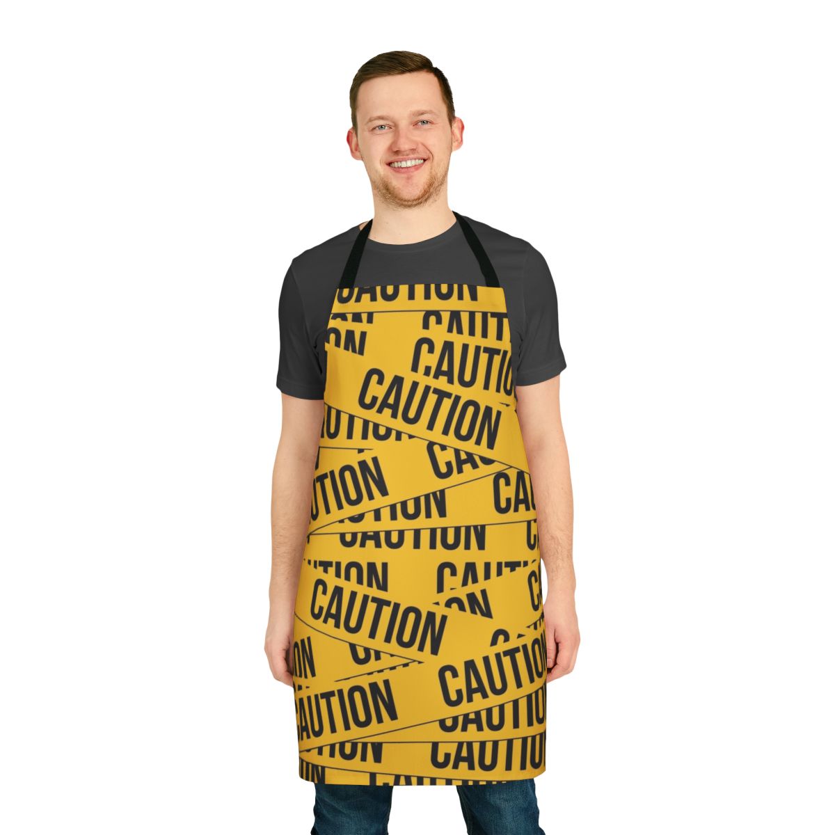 A vibrant yellow caution apron with bold black and white police tape design