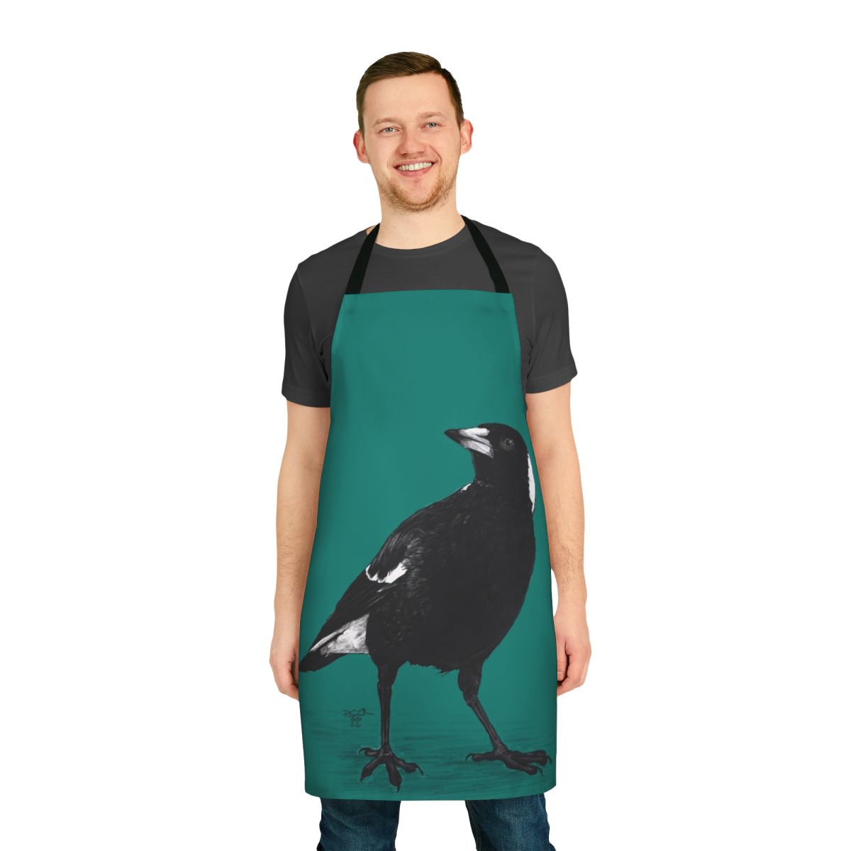 Black and white bird apron featuring an illustration of an Australian magpie
