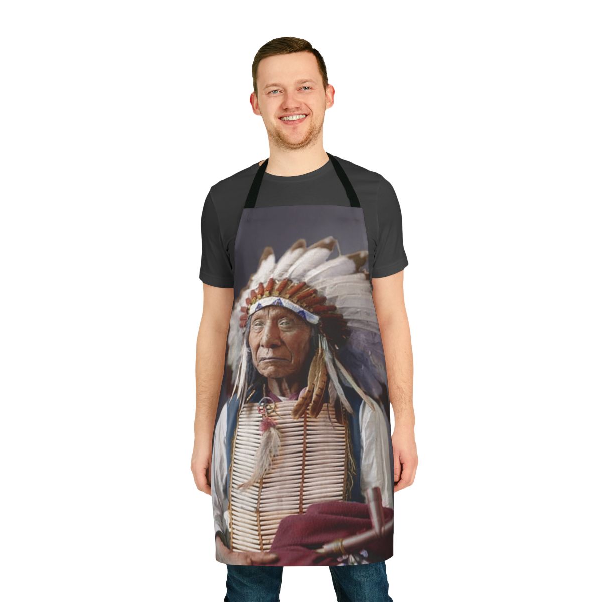 Vibrant red and black apron featuring a portrait of Lakota leader Red Cloud