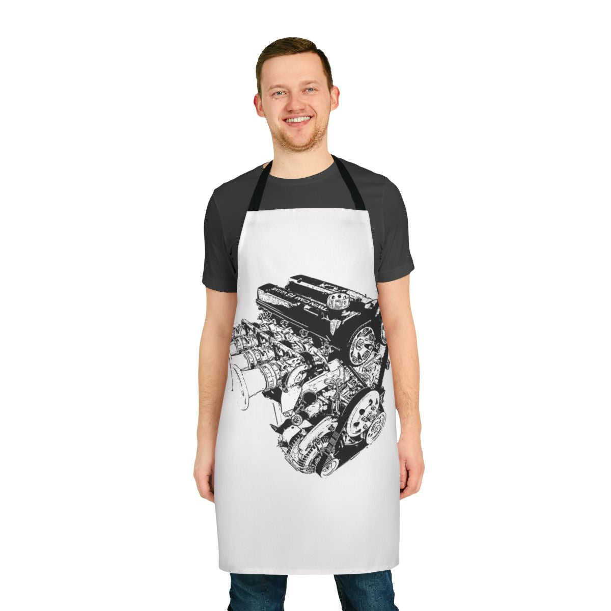 A black apron with a racing engine design, perfect for car enthusiasts, mechanics, and workshop owners.