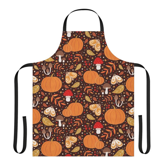 Colorful autumn-themed apron featuring leaves, berries, pumpkins, and other natural elements in a gouache style illustration.