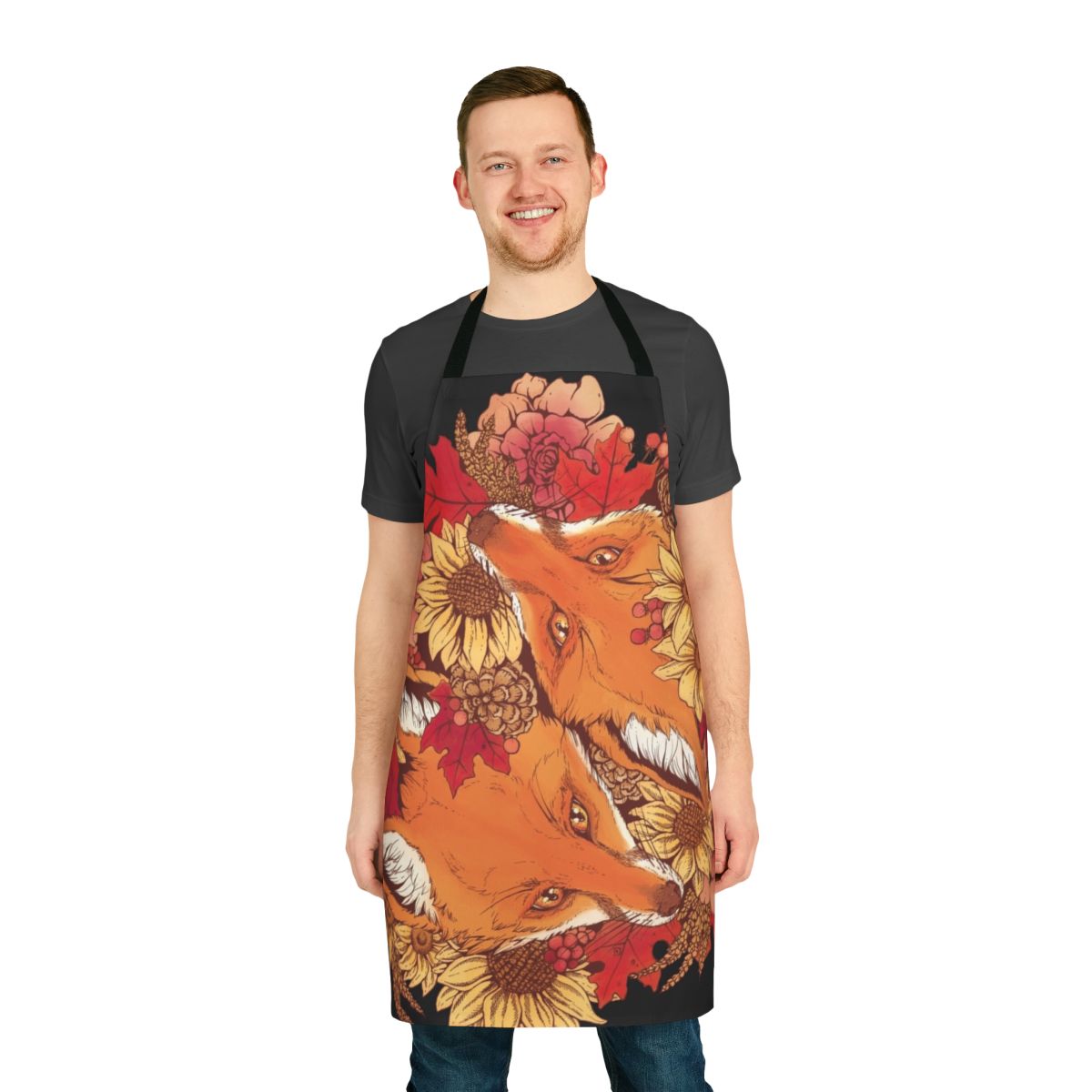 Apron featuring illustrations of red foxes, sunflowers, pinecones, and fall leaves