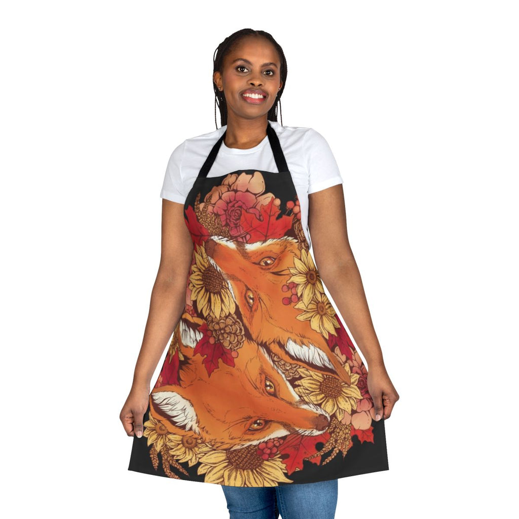 Apron featuring illustrations of red foxes, sunflowers, pinecones, and fall leaves