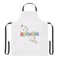 A high-quality kitchen apron featuring an autumnal, leaf-themed design inspired by the LGBTQ+ webcomic series "Heartstopper".