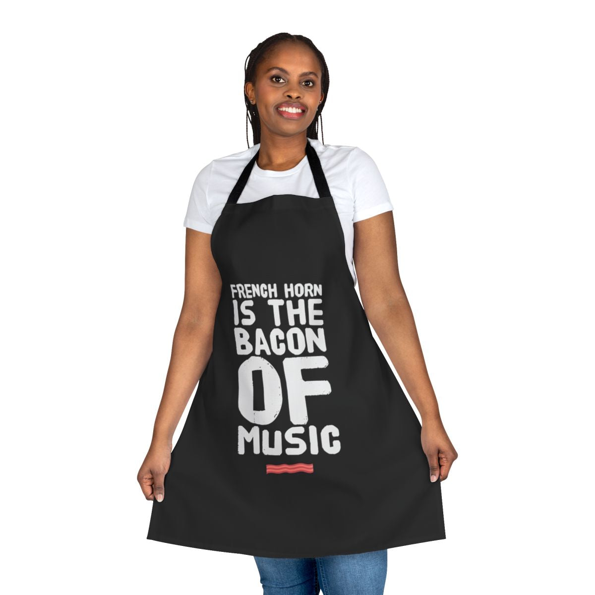 A funny apron featuring the text "French Horn is the Bacon of Music" on a black background.
